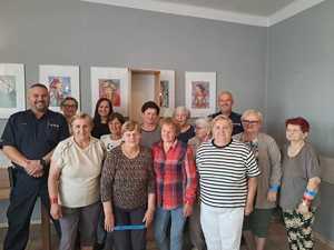 policjanci na spotkaniu z seniorami.
